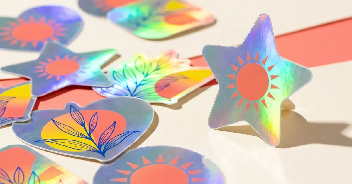 Holographic custom stickers reflecting rainbow colours